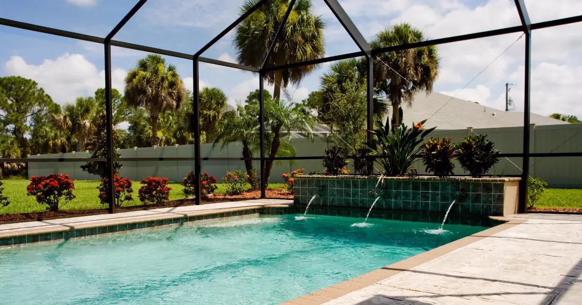 Detailed pool enclosure screen and frame cleaning in Kissimmee FL by PatioShield, restoring pool areas to pristine condition