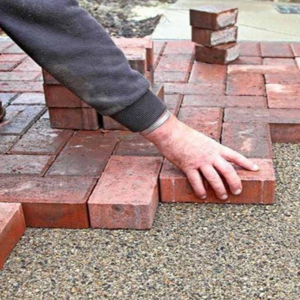 Expert paver installation and repair by PatioShield, offering precision craftsmanship for seamless outdoor patios, driveways, and walkways