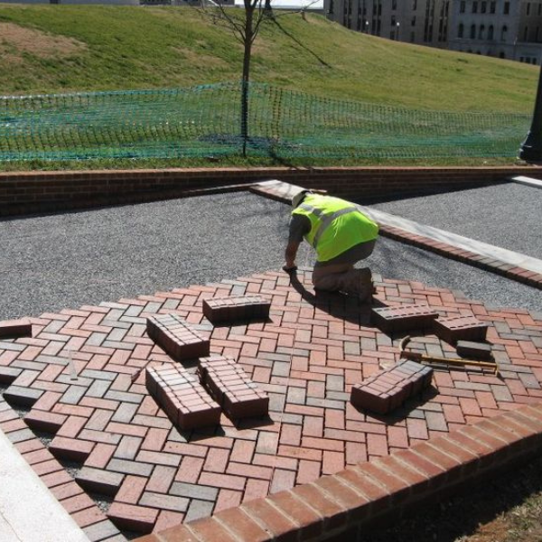 Professional paver installation and repair by PatioShield, delivering expert craftsmanship to create and restore beautiful patios, driveways, and walkways