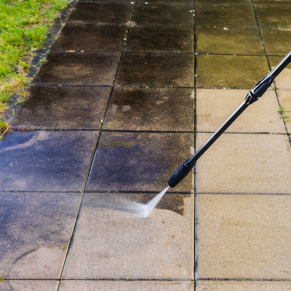 Professional paver and concrete pressure washing by PatioShield, removing stains, dirt, and grime to restore clean, durable outdoor surfaces