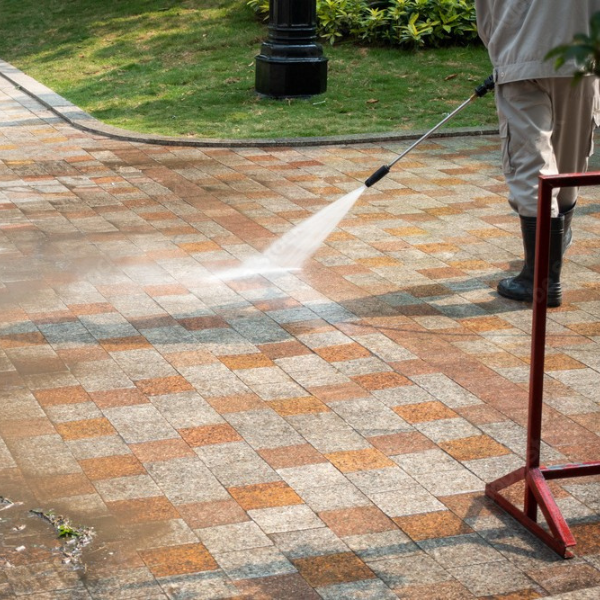 Professional driveway pressure washing service in Orlando FL by PatioShield, removing stains, dirt, and grime to restore a clean, fresh look